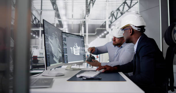 engineer doing 3d cad model design on computer at factory
